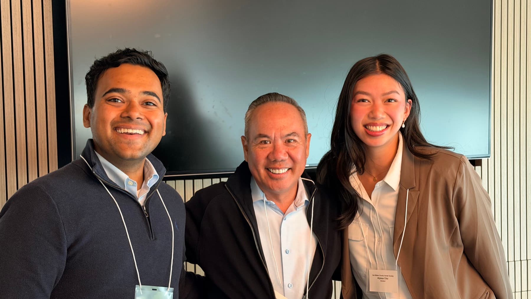 Dr. Michael Njo with future dental professionals at the SMCDS Peninsula Dental Compliance Symposium.