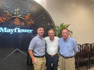Dr. Michael Njo with peers at a Mayflower gathering.