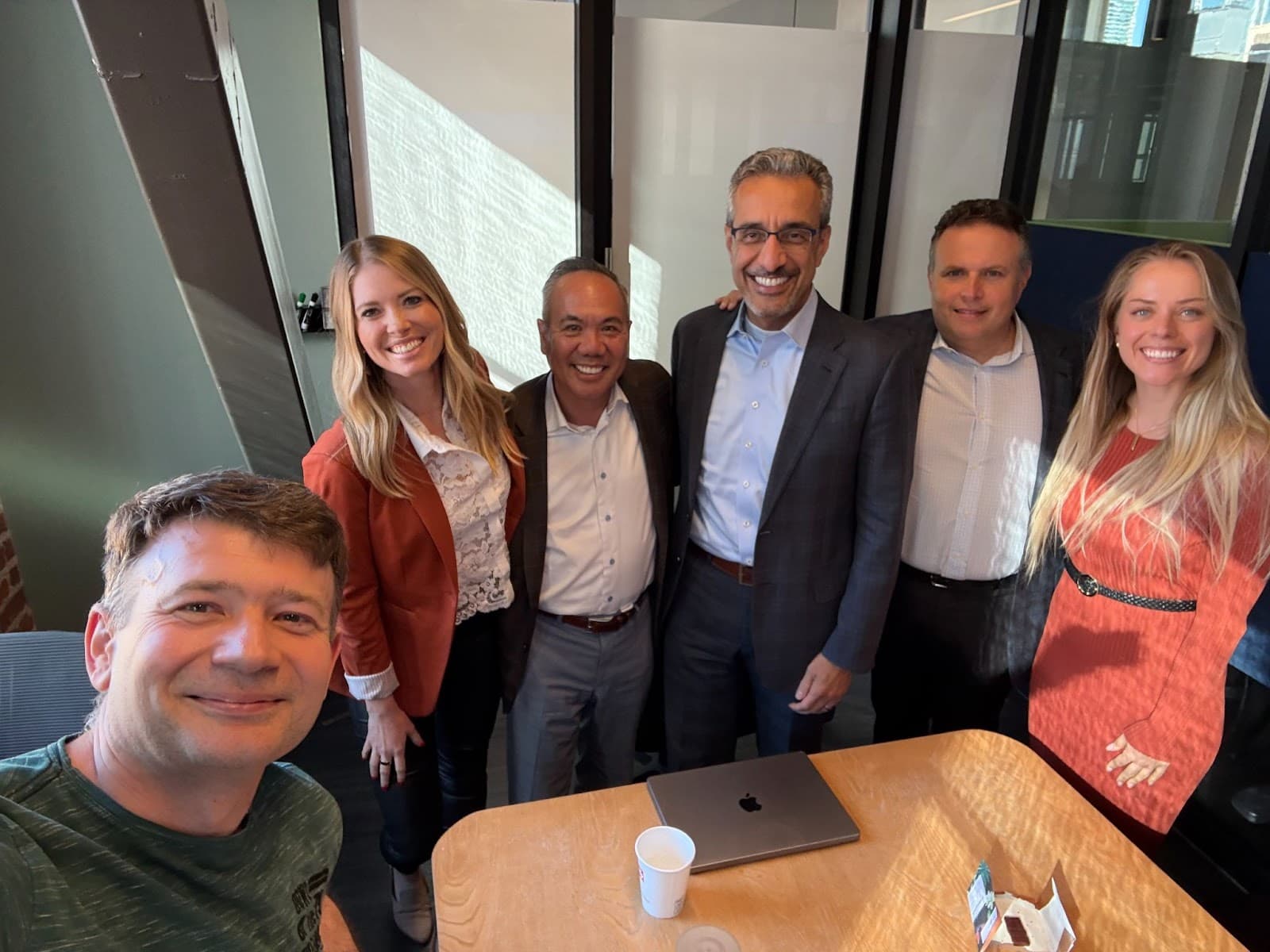 Candid office photo with an AI startup founder and board of directors, including Nader Nadershahi, former Dean of the University of the Pacific School of Dentistry